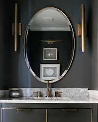 Золотое овальное зеркало "Хоган"